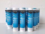six tubes of multi - use toothpaste are lined up on a table