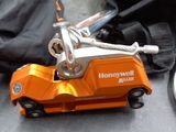 a toy truck that is sitting next to a pair of scissors