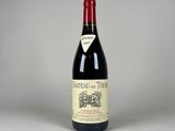 a bottle of wine that is sitting on a table