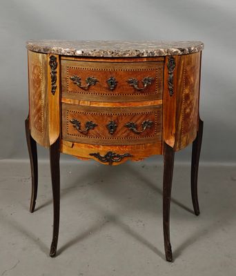 an image of a marble top chest of drawers on a stand