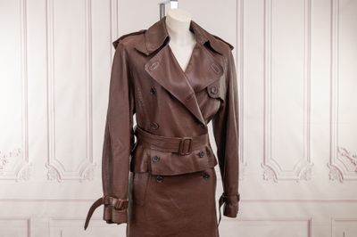 brown leather trench coat on a mannequin mannequin mannequin mannequin mannequin mannequin mannequin mannequin manne