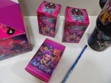a pink box with a picture of a girl ' s face on it