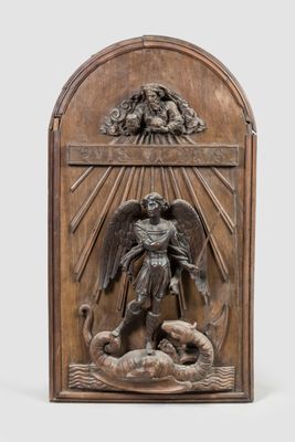 une image représentant une statue d'un ange et d'un chien