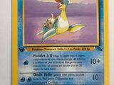 a close up of a pokemon card with a picture of a bird on it