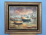 un tableau représentant des bateaux, accroché au mur