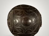 an image of a brown ball with a design on it