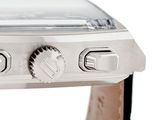 a close up of a watch on a white surface