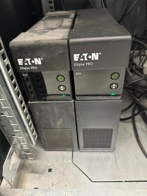 two electronic equipment that are sitting on top of each other