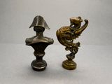 pair of antique brass figurines of a man and a woman