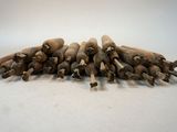 a lot of sticks that are sitting on a table