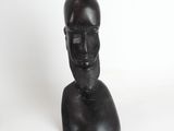 sculpture of a man ' s head on a white background