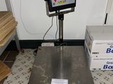 an image of a scale with a box on it