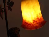 an image of a lamp with a little boy on it