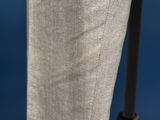 a close up of a pair of pants hanging on a clothes rack