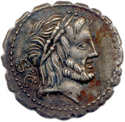 Gros plan sur une pièce de monnaie portant le visage d'un homme
