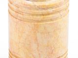 beige marble vase with silver rim on a white background