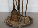 a small table with a bunch of metal items on it