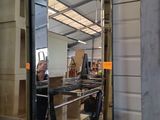 a mirror that is on the wall in the room