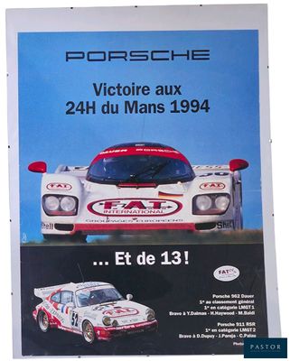 an advertisement for a porsche race car with a picture of the car