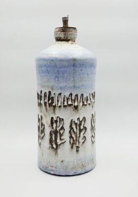 an image of a blue and white vase with writing on it