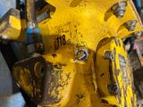 a close up of a yellow fire hydrant with a number on it