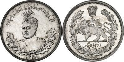 a close up of a coin with a lion on it