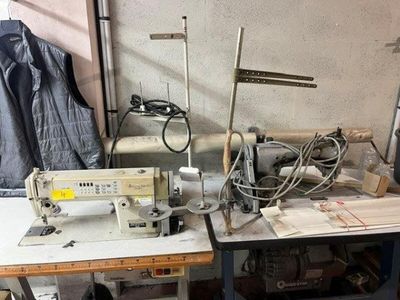a sewing machine sitting on a table in a room