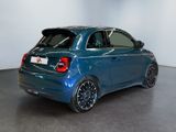 a picture of a blue car parked in a showroom