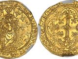 a gold coin with a cross on the front and a cross on the back