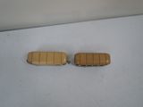 pair of yellow plastic car door handles for a toy car