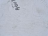 a sign on the side of a building that says