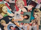 many different pictures of marilyn monroe on a table