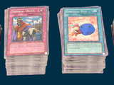 several cards are stacked on top of each other on a table