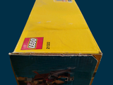 a yellow box with a picture of a man riding a horse