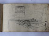 an open book with a drawing of a person laying on a bed