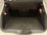 a trunk of a car with the doors open