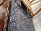 many chairs that are stacked on top of each other