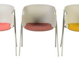 three chairs with different colored seats sit side by side on a white surface