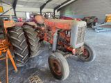 a tractor that is parked inside of a building