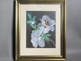 painting of a white flower in a gold frame on a gray background