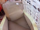a chair that is sitting in a room with a lot of furniture