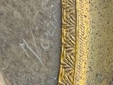 a picture of a painting of a woman in a gold frame