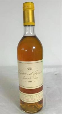 an image of a bottle of wine sitting on top of a table