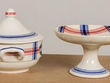 a small bowl and a small bowl sitting on a table