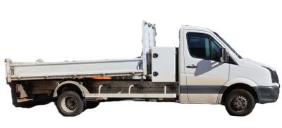 a white truck that is parked on the side of the road