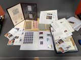 une table sur laquelle sont posés de nombreux papiers et photos