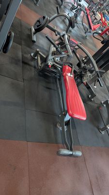 a bike that is sitting on the floor in the gym