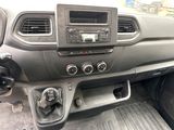 a dashboard of a car with a radio and other items in it