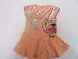 an orange dress with a tiger on the front and a tiger on the back