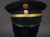 a black hat with gold trim and a crown on top of it